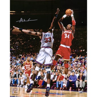 Hakeem Olajuwon Houston Rockets Autographed 16" x 20" Jumping Photograph
