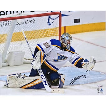 Jordan Binnington St. Louis Blues Autographed 16" x 20" Glove Save Photograph