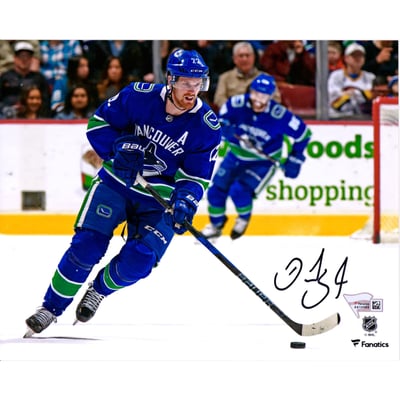 Daniel Sedin Vancouver Canucks Autographed 8" x 10" Blue Jersey Skating Photograph