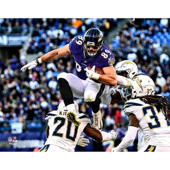 Mark Andrews Baltimore Ravens Unsigned Hurdling Defender Photograph