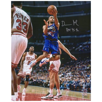 Damon Stoudamire Toronto Raptors Autographed 16" x 20" Lay Up vs. Chicago Bulls Photograph with "ROY 95-96" Inscription