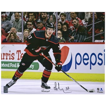Andrei Svechnikov Carolina Hurricanes Autographed 16" x 20" Black Jersey Skating Photograph