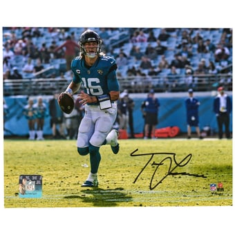 Trevor Lawrence Jacksonville Jaguars Autographed 8'' x 10'' Horizontal Teal Jersey Rollout Photograph
