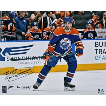 Evan Bouchard Edmonton Oilers Autographed 16" x 20" Blue Jersey Skating Photograph with "Lets Go Oilers!" Inscription