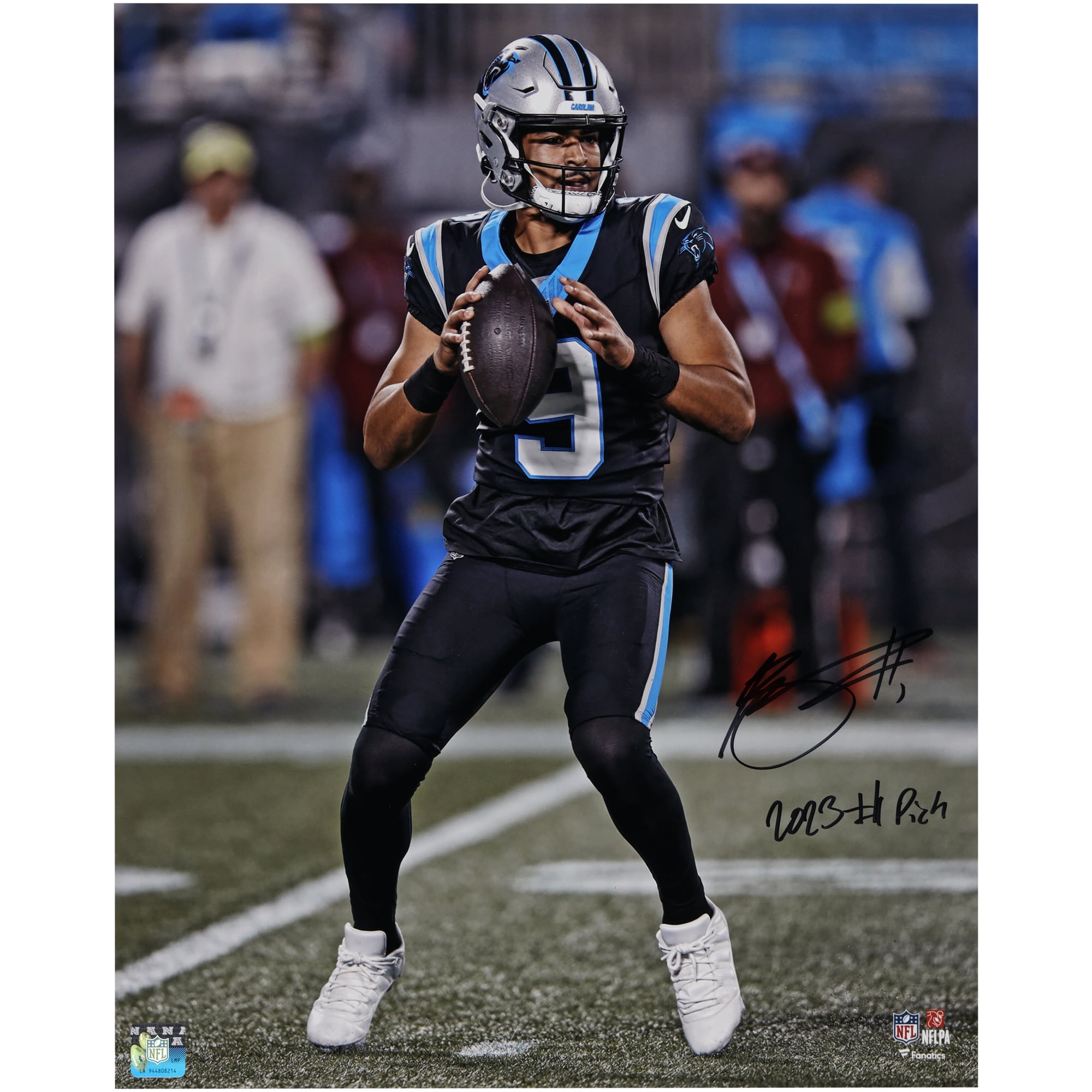 Bryce Young Carolina Panthers Autographed 16" x 20" Vertical Passing in Black Jersey Photograph with "2023 #1 Pick" Inscription