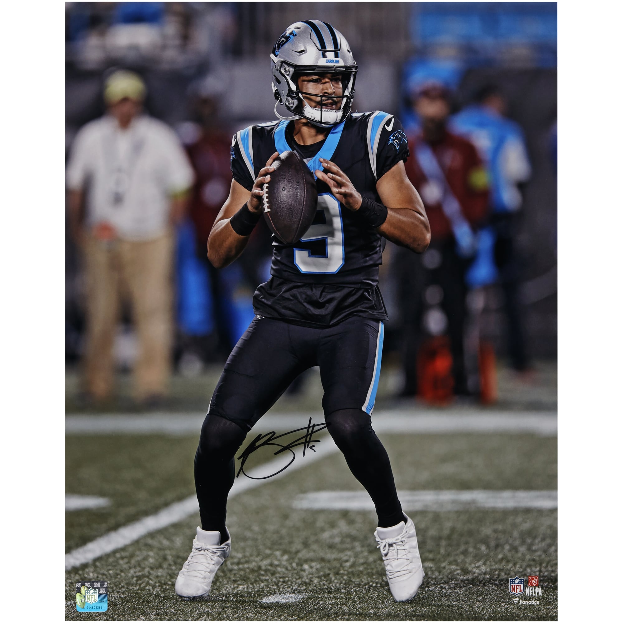 Bryce Young Carolina Panthers Autographed 16" x 20" Vertical Passing in Black Jersey Photograph