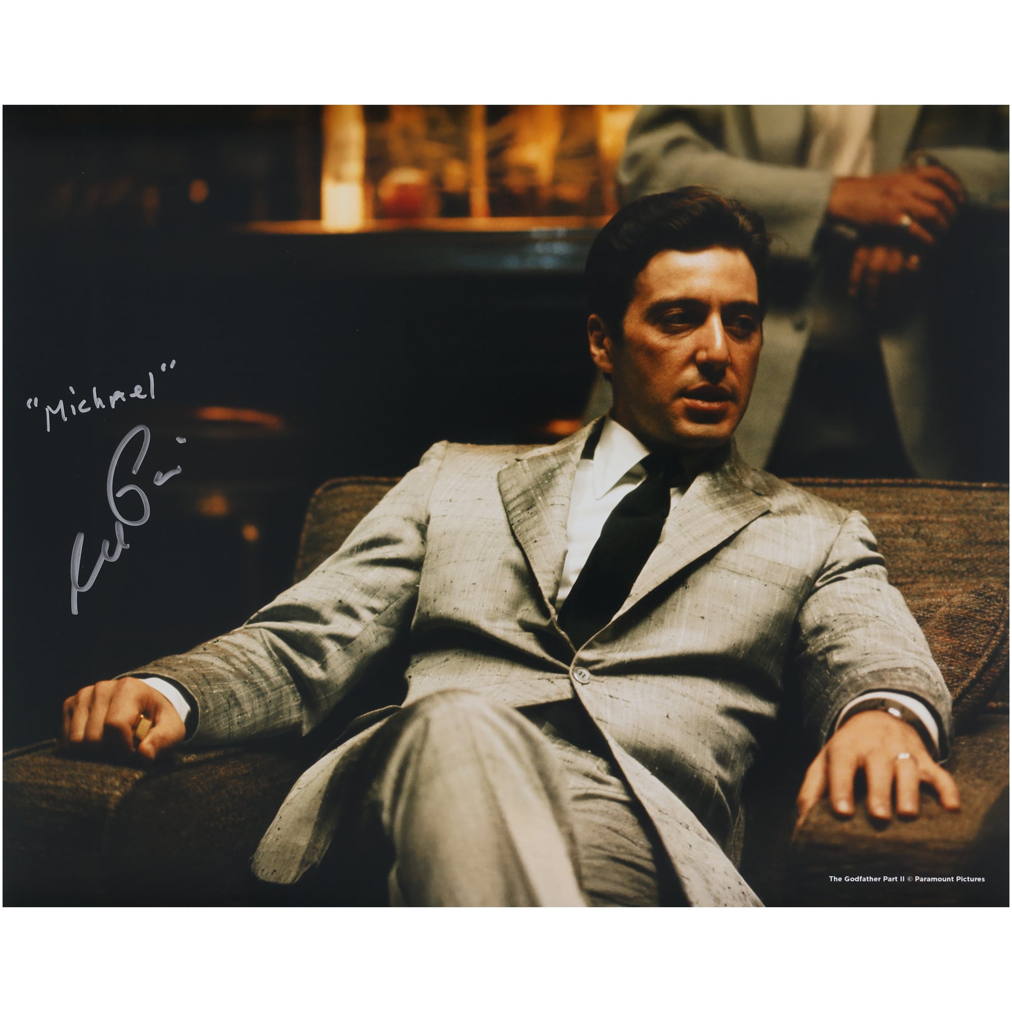 Al Pacino The Godfather Autographed 16" x 20" Sitting In Silver Suit Photograph with "Michael" Inscription