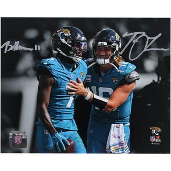 Trevor Lawrence & Brian Thomas Jr. Jacksonville Jaguars Autographed 8" x 10" Teal Jersey Spotlight Photograph