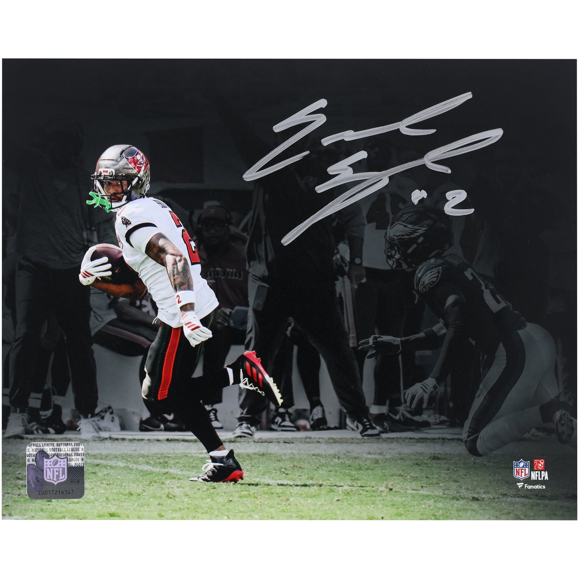 Emeka Egbuka Tampa Bay Buccaneers Autographed 8" x 10" White Jersey Rushing Touchdown Spotlight Photograph