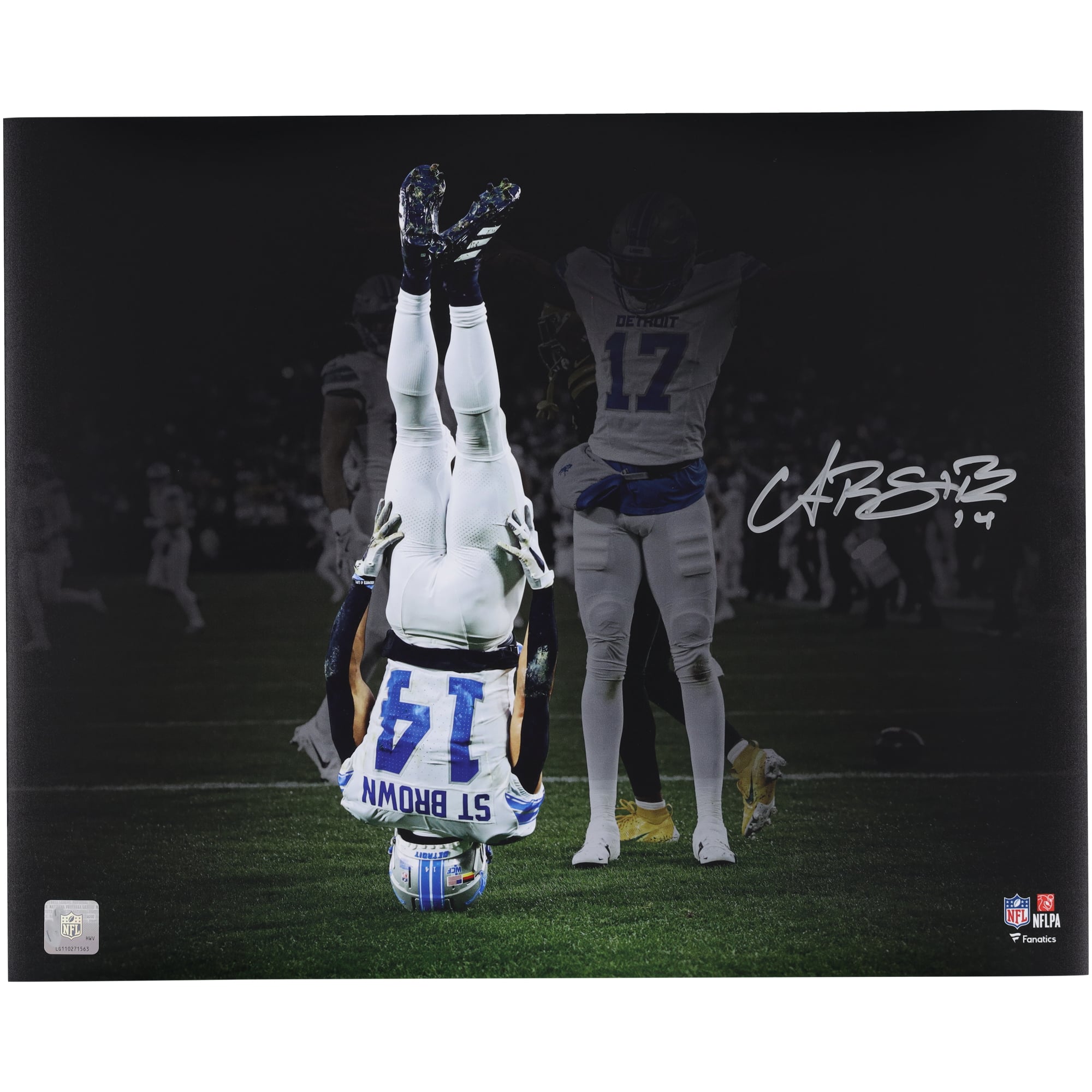 Amon-Ra St. Brown Detroit Lions Autographed 16" x 20" Head Stand Celebration Spotlight Photograph