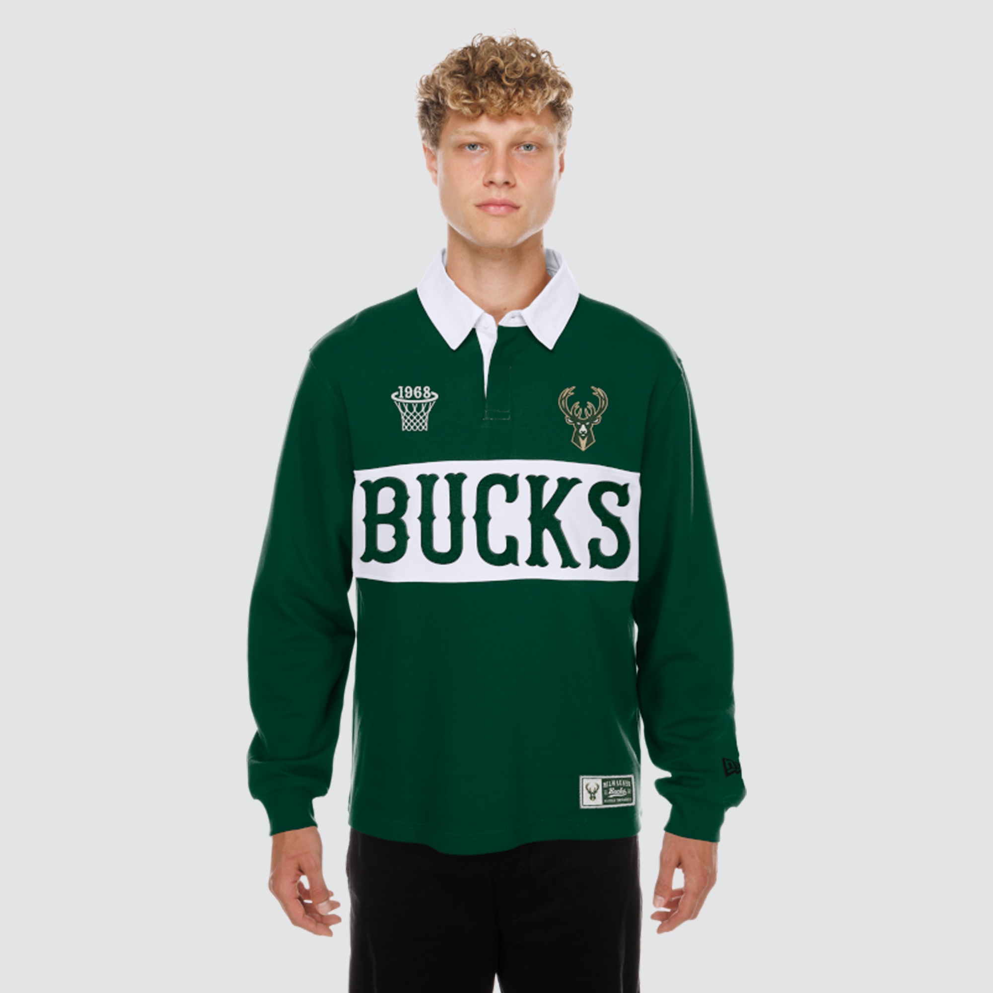 Men's New Era Hunter Green Milwaukee Bucks Rugby Long Sleeve Polo