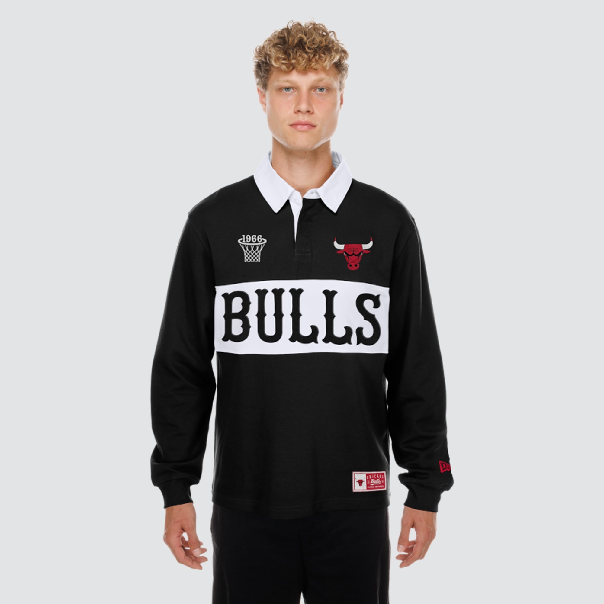 Men's New Era Black Chicago Bulls Rugby Long Sleeve Polo