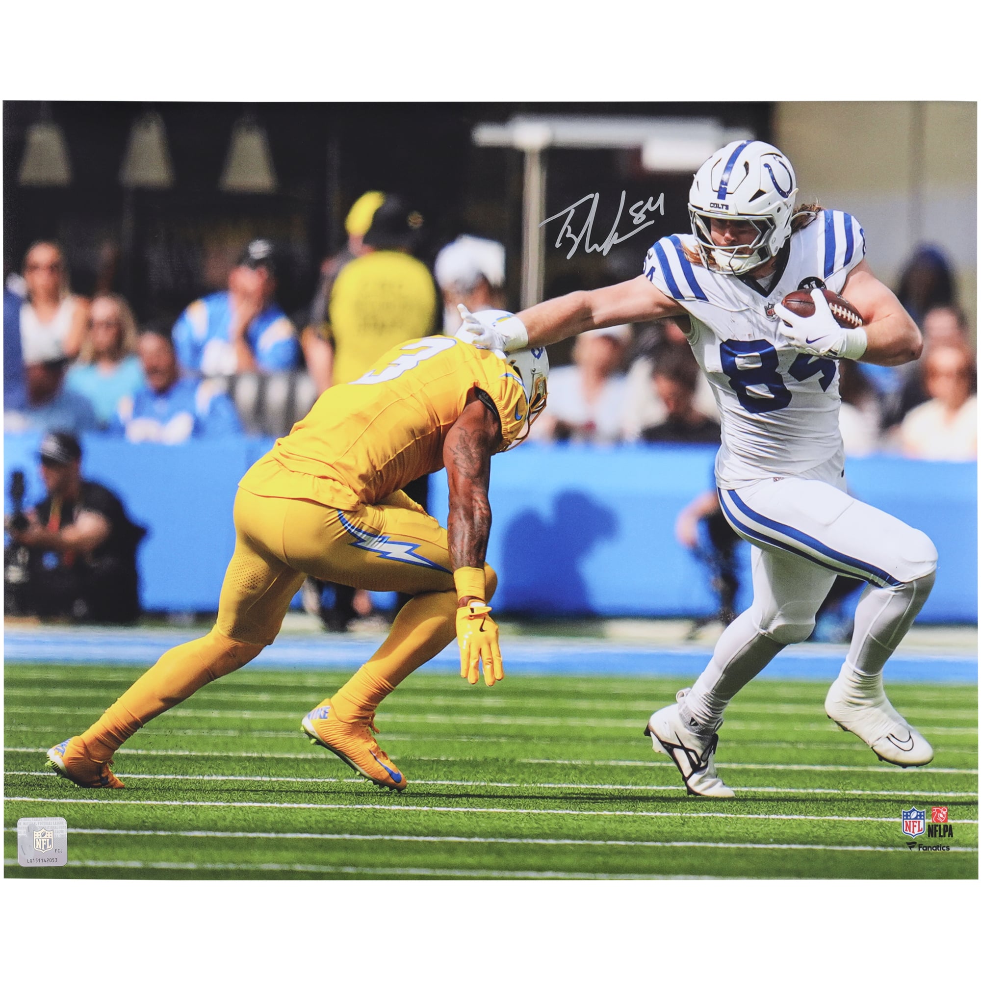 Tyler Warren Indianapolis Colts Autographed 16" x 20" Stiff Arm vs. Los Angeles Chargers Photograph