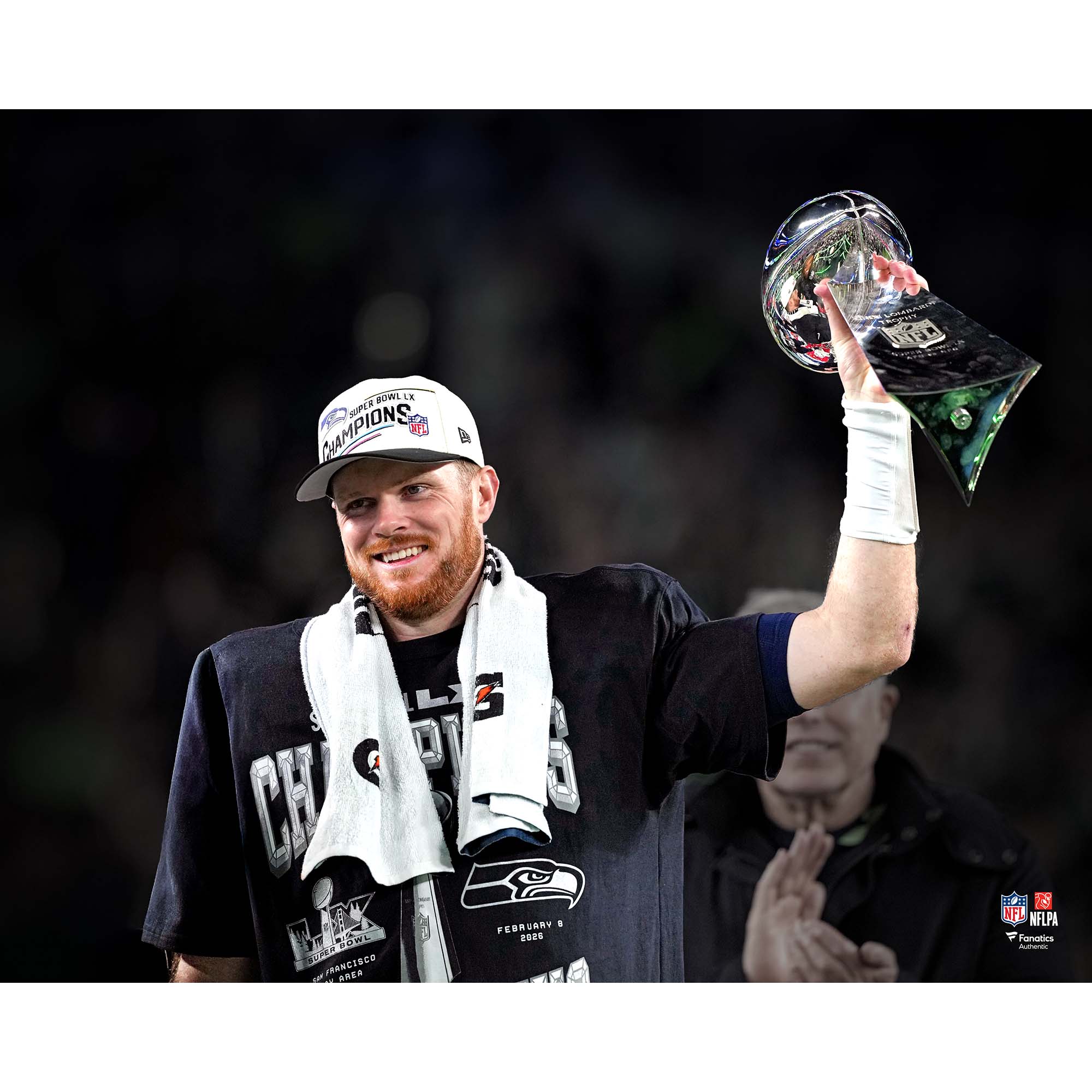 Sam Darnold Seattle Seahawks Unsigned Super Bowl LX Champions Lifting Lombardi Trophy Spotlight Photograph