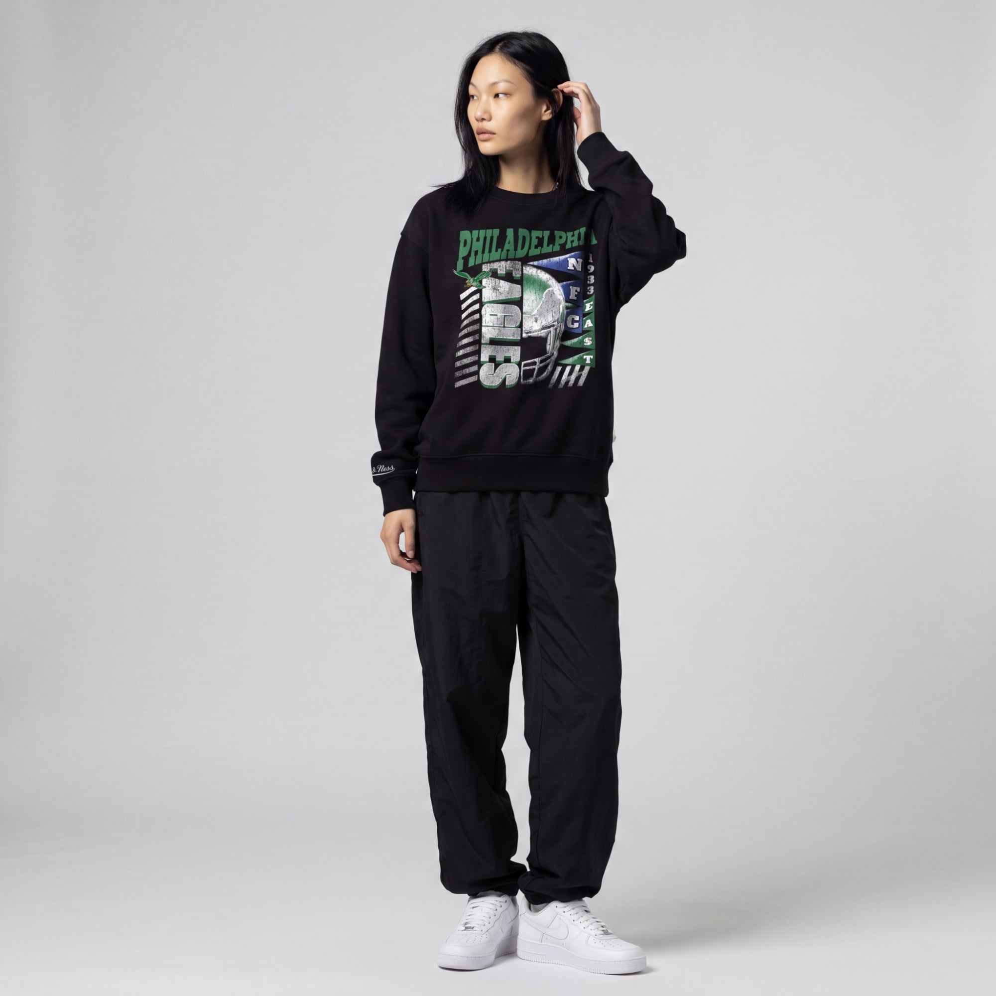 Sweat-shirt à col rond Mitchell & Ness noir pour femme, motif Philadelphia Eagles.