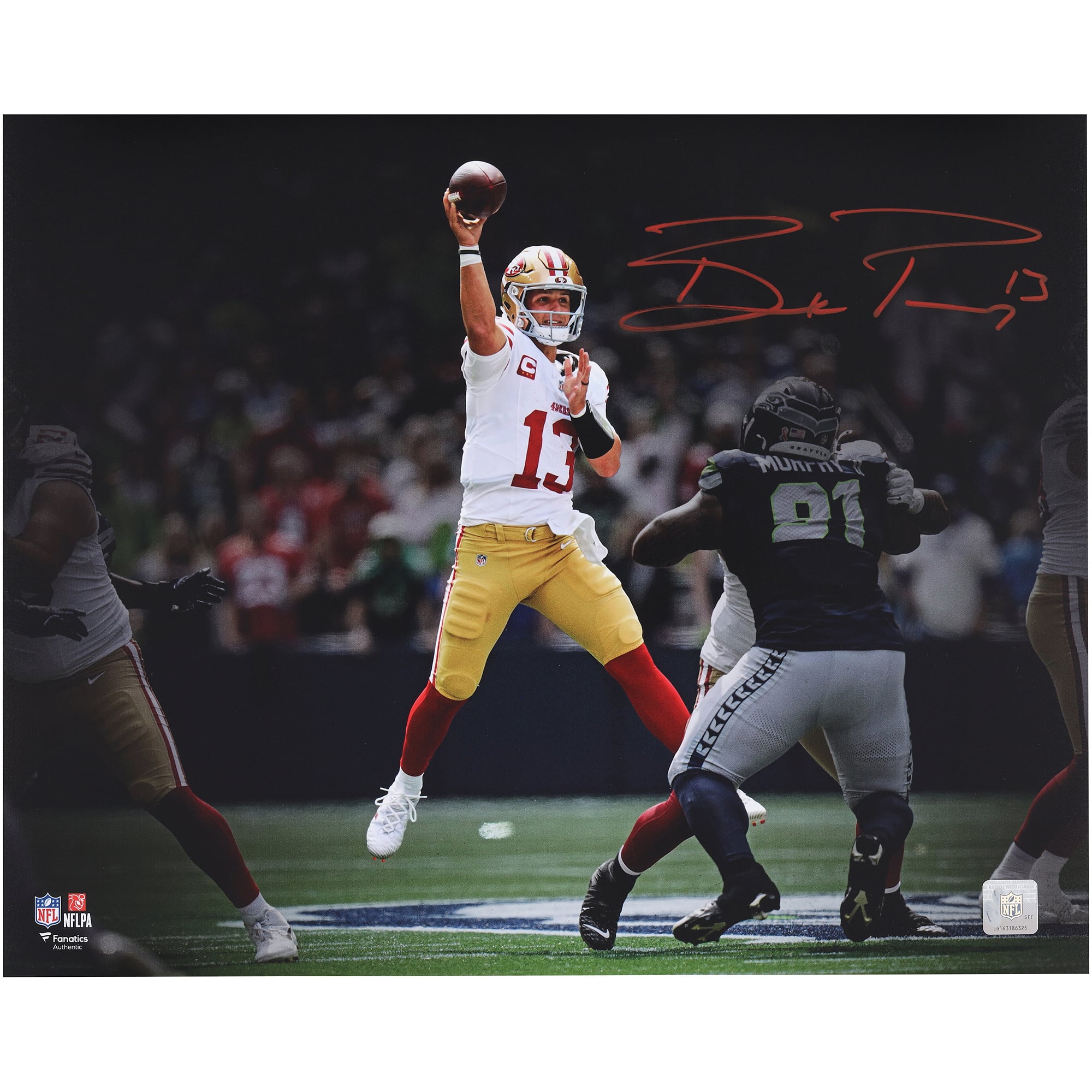 Brock Purdy San Francisco 49ers Autographed 16" x 20" Jump Throw Spotlight Photograph