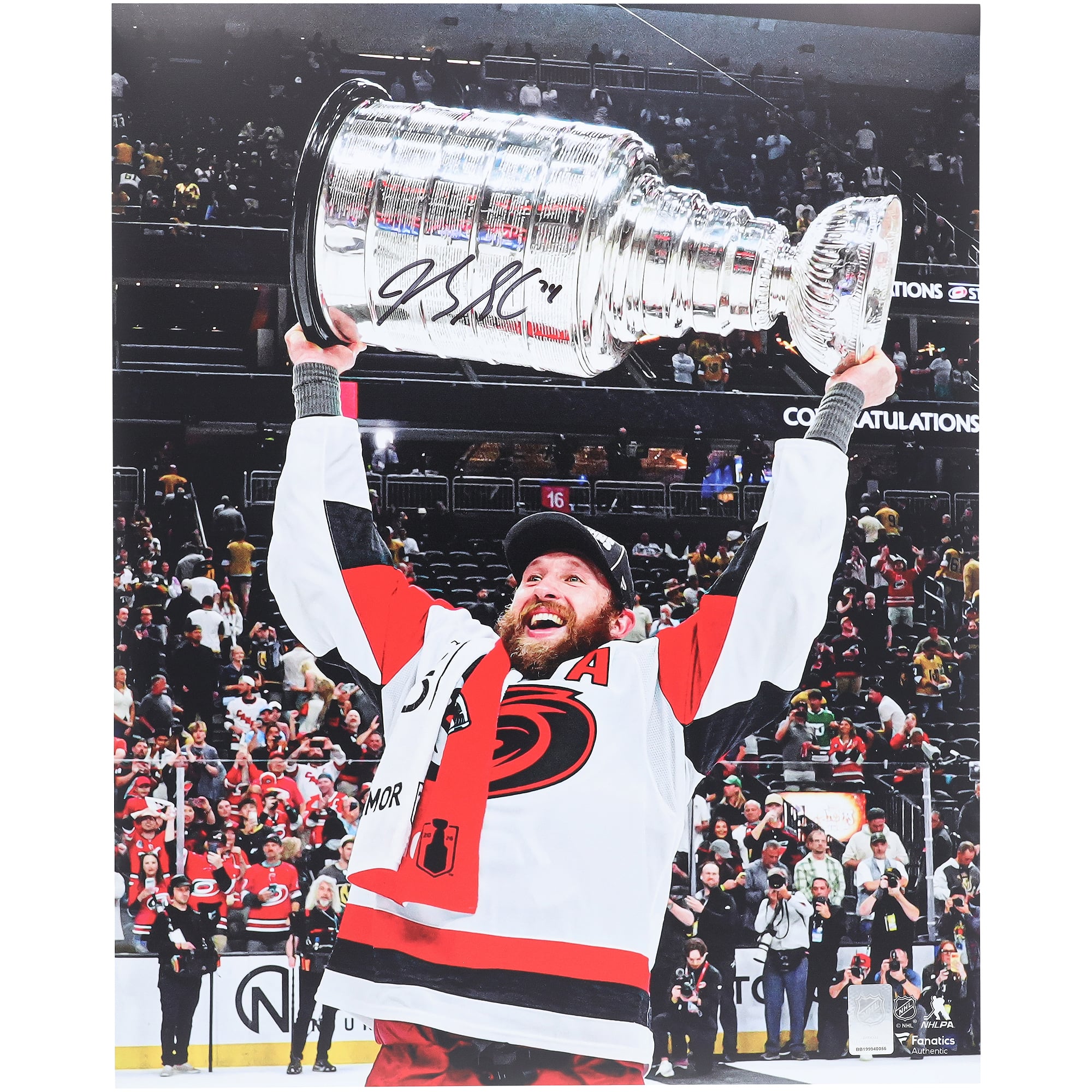 Jaccob Slavin Carolina Hurricanes Autographed 2026 Stanley Cup Champions 16" x 20" Raising Cup Photograph
