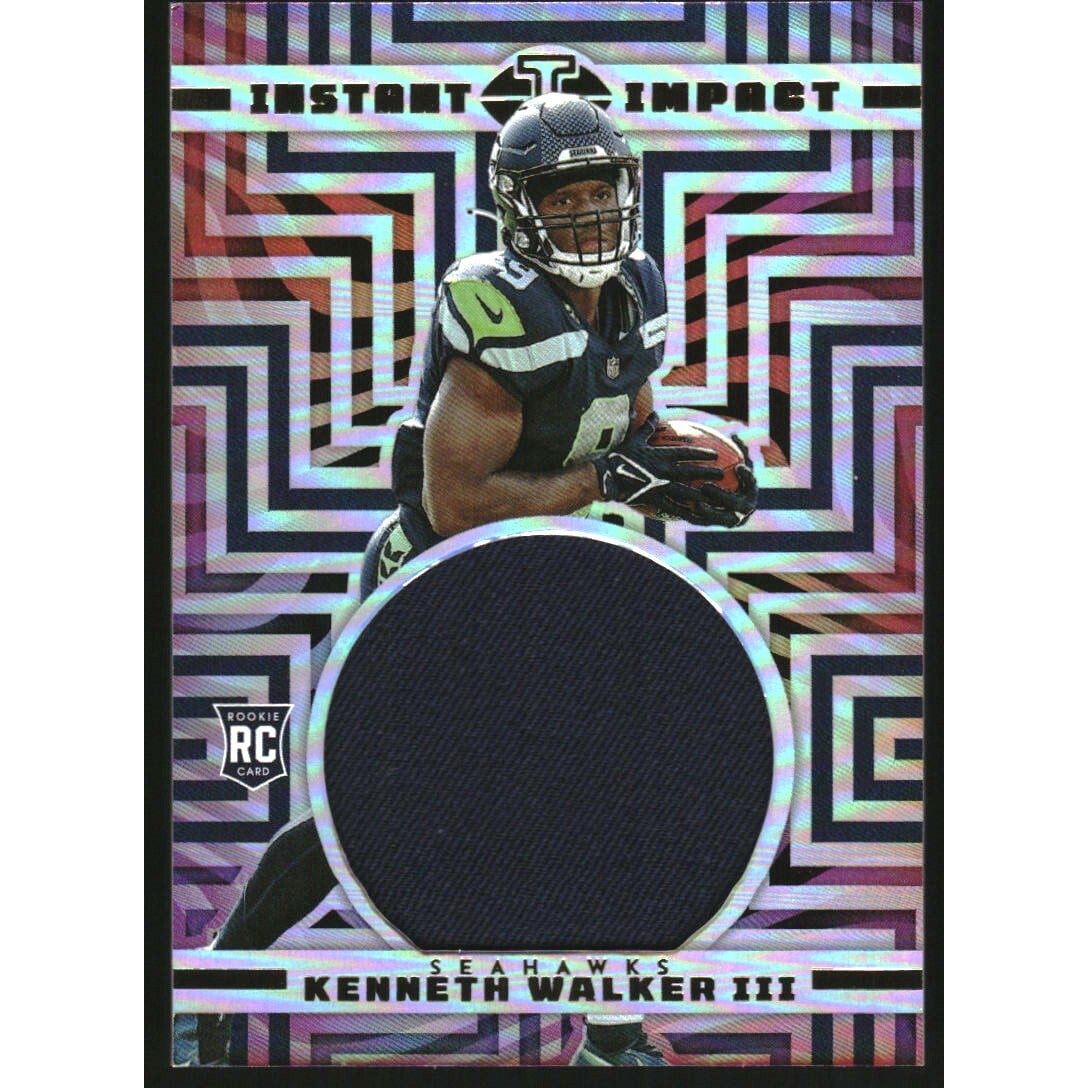 2022 Panini Illusions Instant Impact Jerseys #23 Kenneth Walker III. rookie card picture