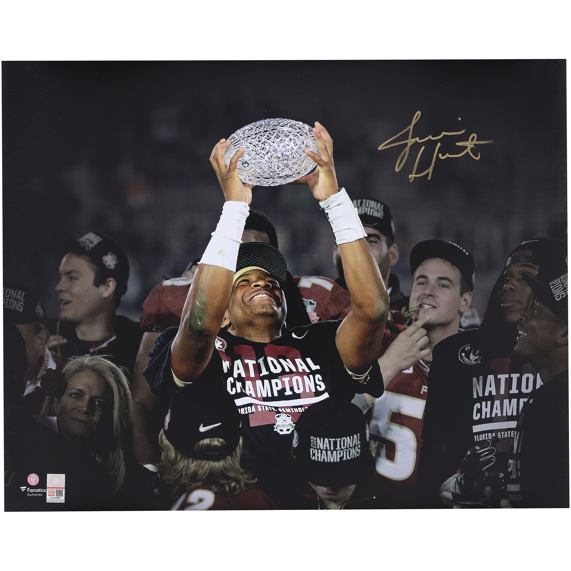 Jameis Winston Florida State Seminoles Autographed 16" x 20" Holding BCS Trophy Spotlight Photograph
