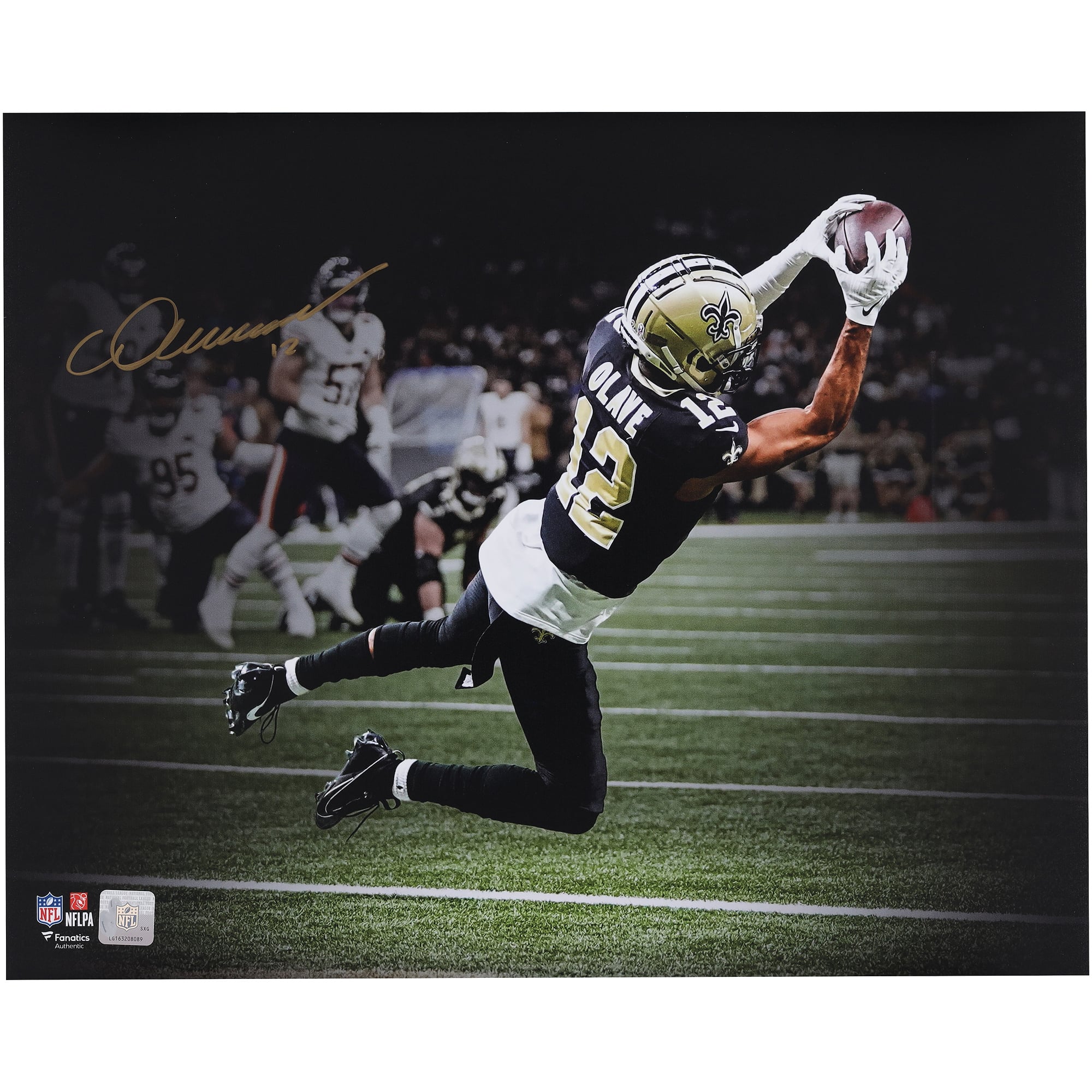 Chris Olave New Orleans Saints Autographed 16" x 20" Touchdown vs. Chicago Bears Spotlight Photograph